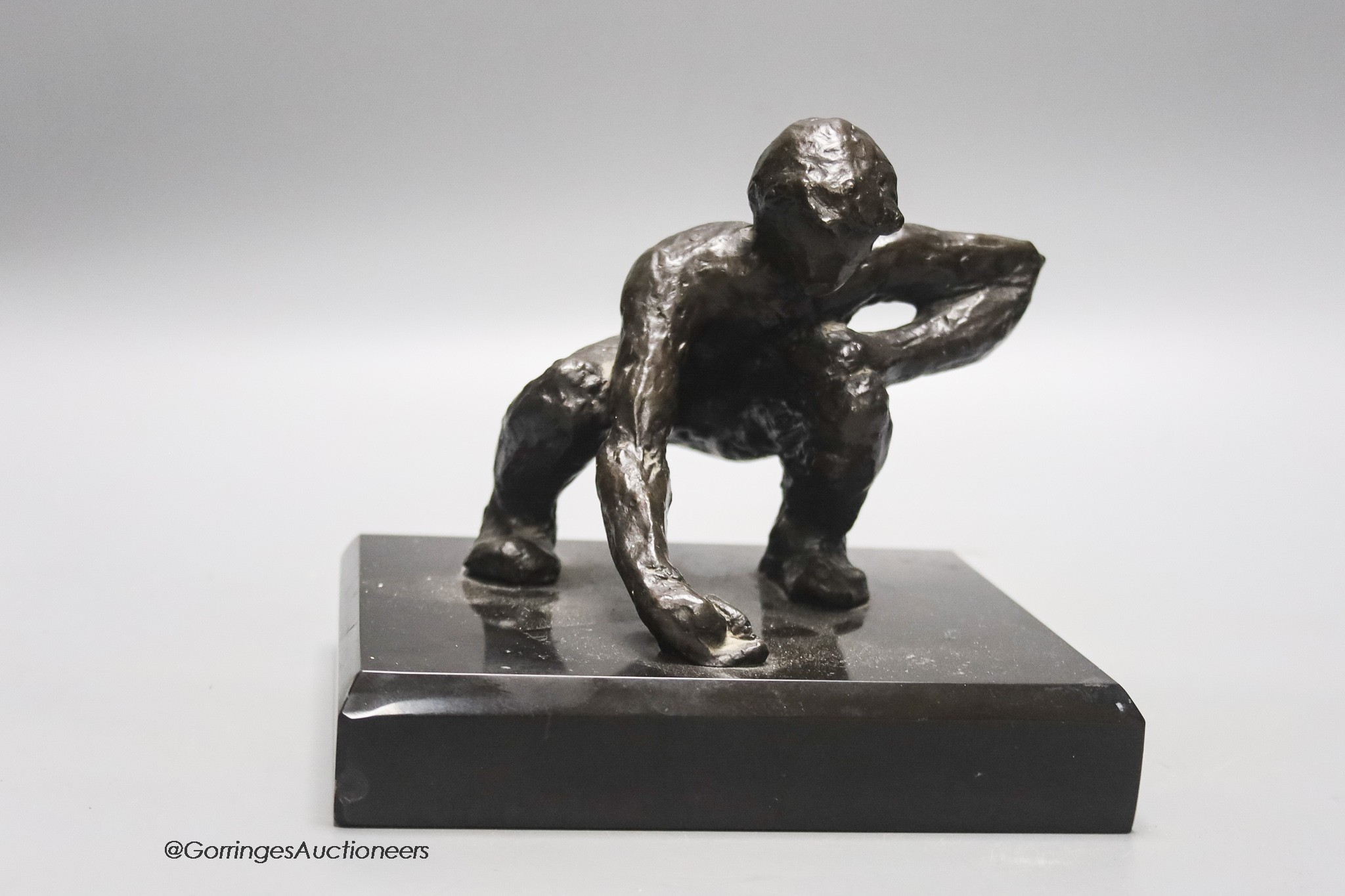 Victor Salmones. An abstract bronze of a crouching male, limited edition 4/10, height 16cm